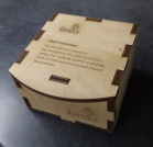 Laser cut and engraved pop-top product box